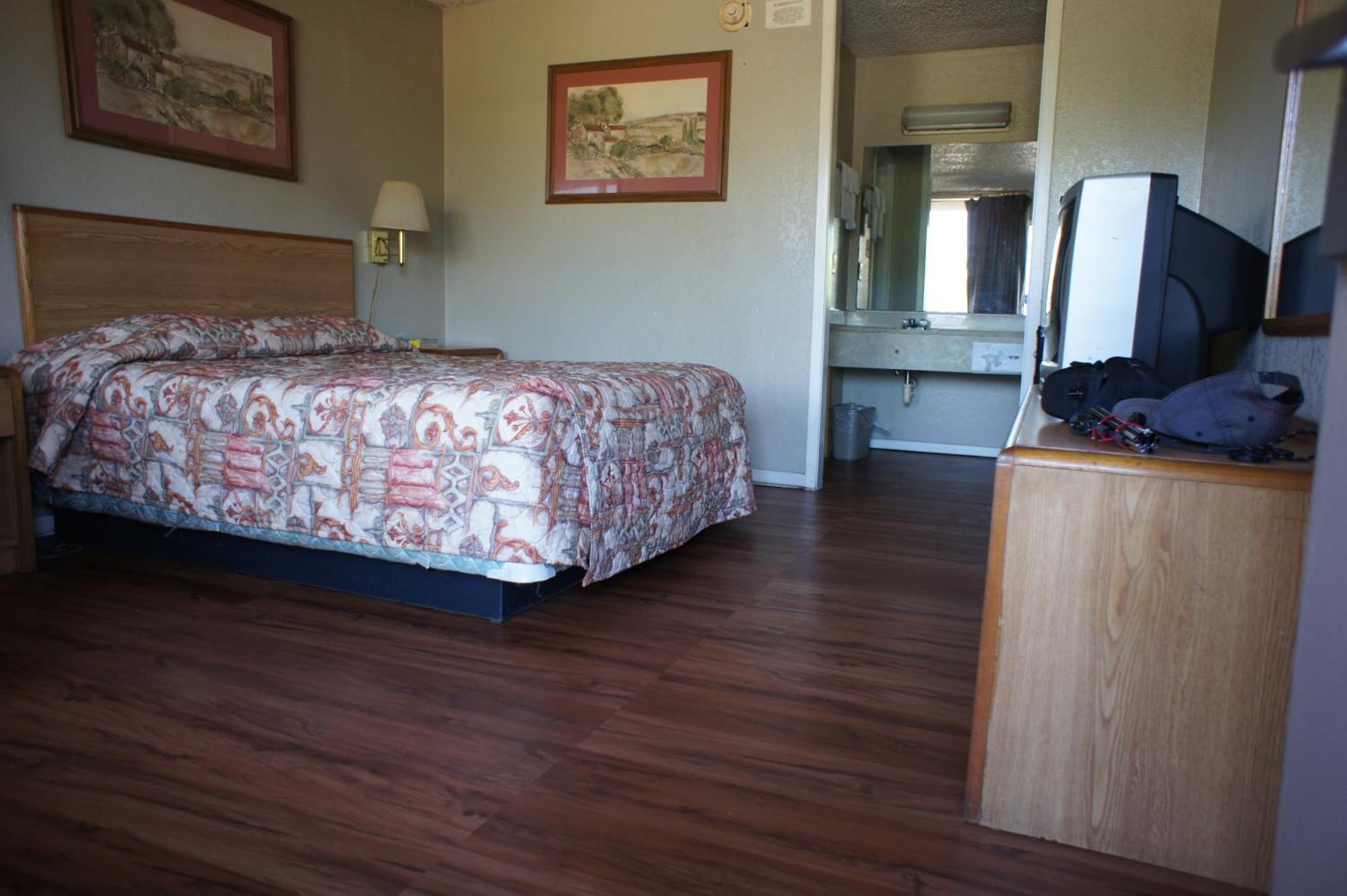 Executive Inn & Suites Orange Rum bild